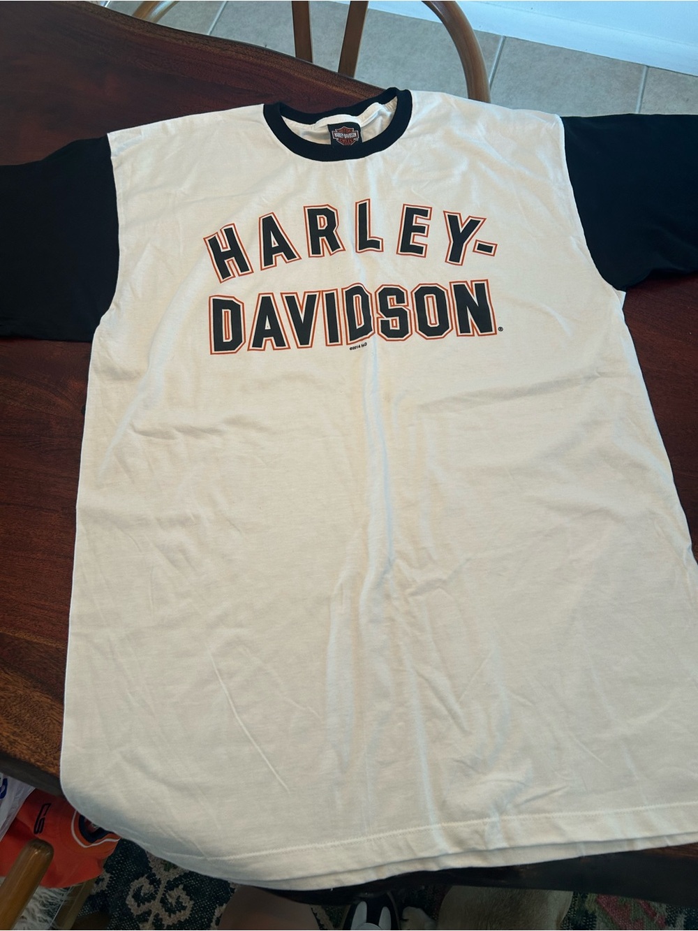 Harley-Davidson White Tee with Black Sleeves and Orange-Outlined Logo